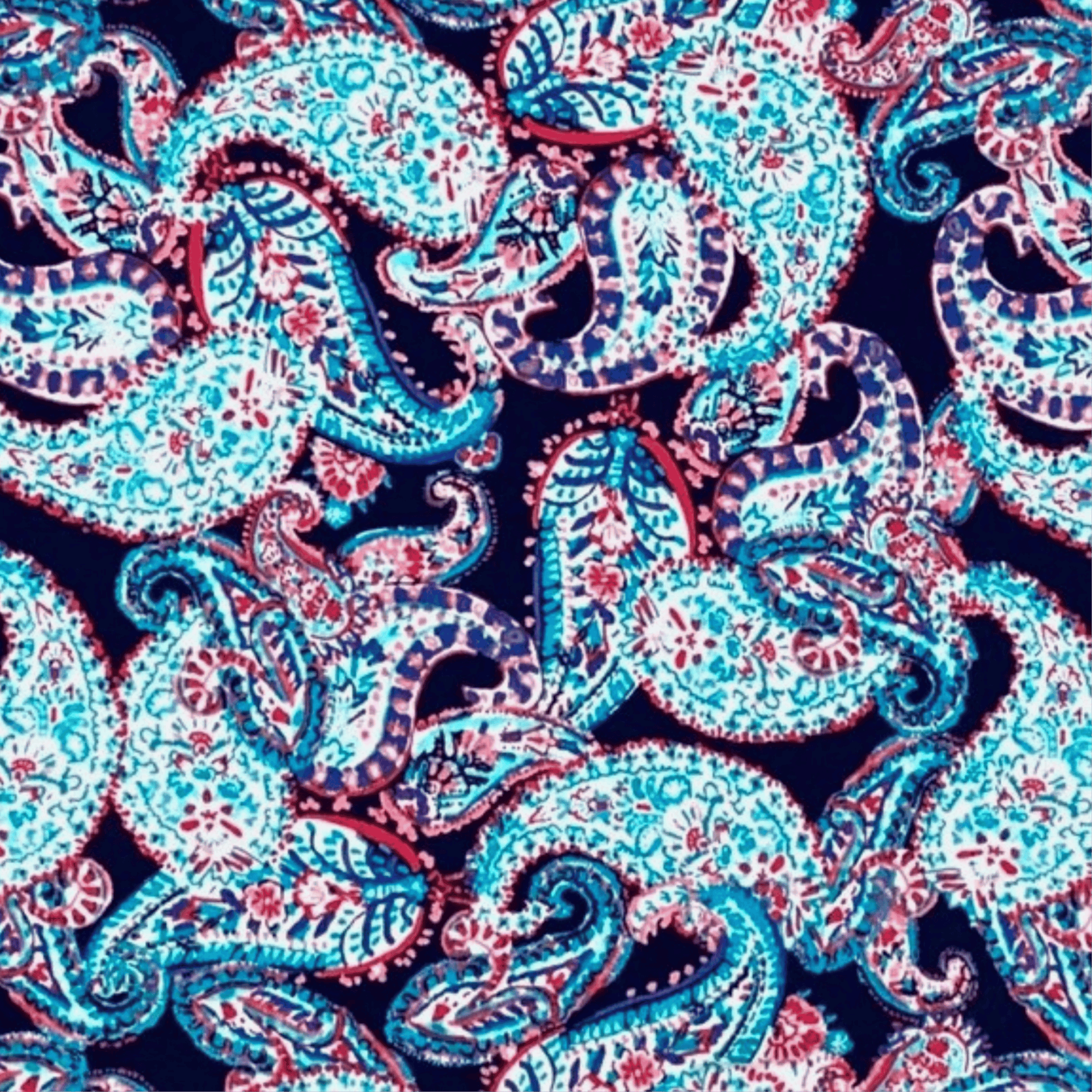Pattern of blue and pink paisleys on a dark background