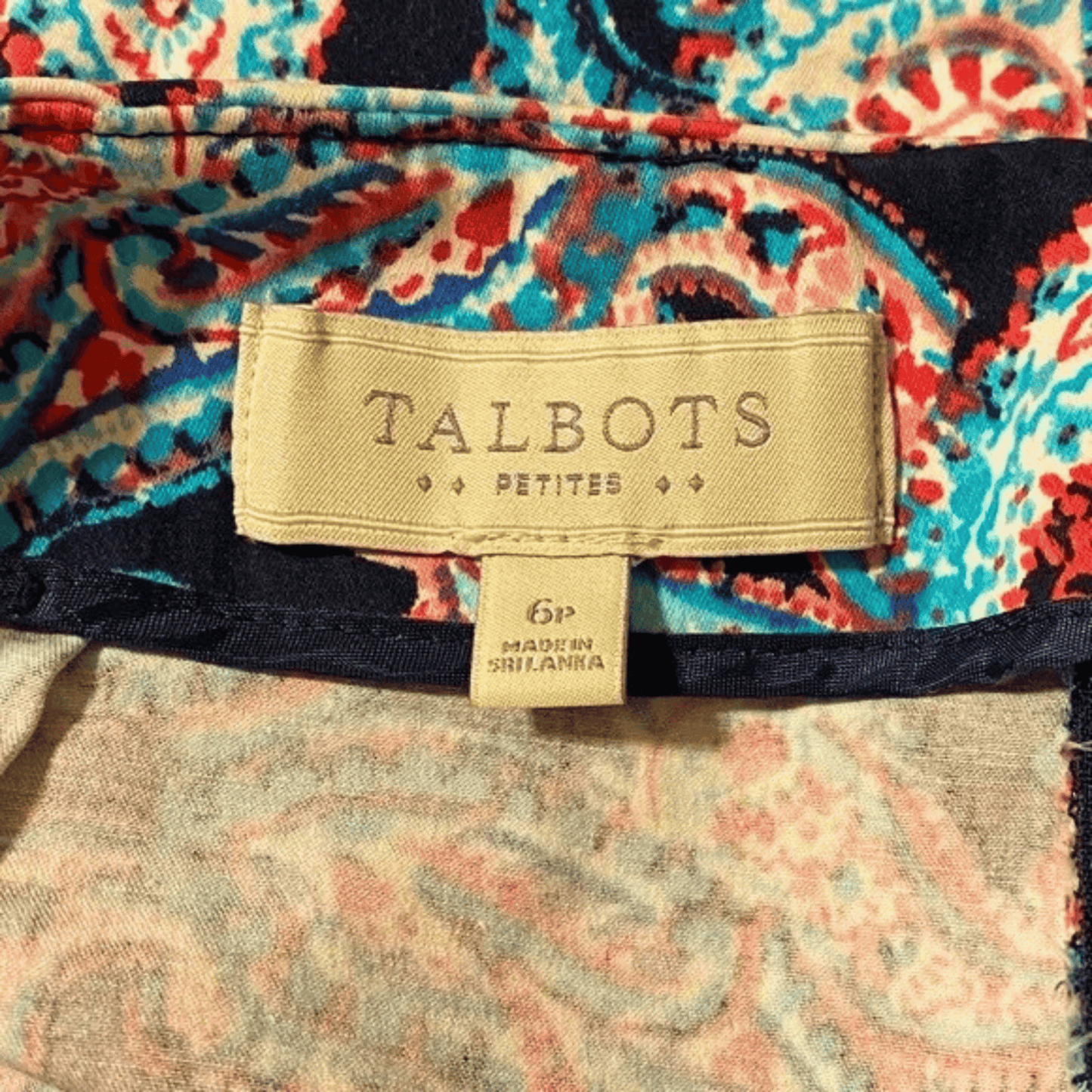 Talbots label on a piece of fabric with a colorful pattern