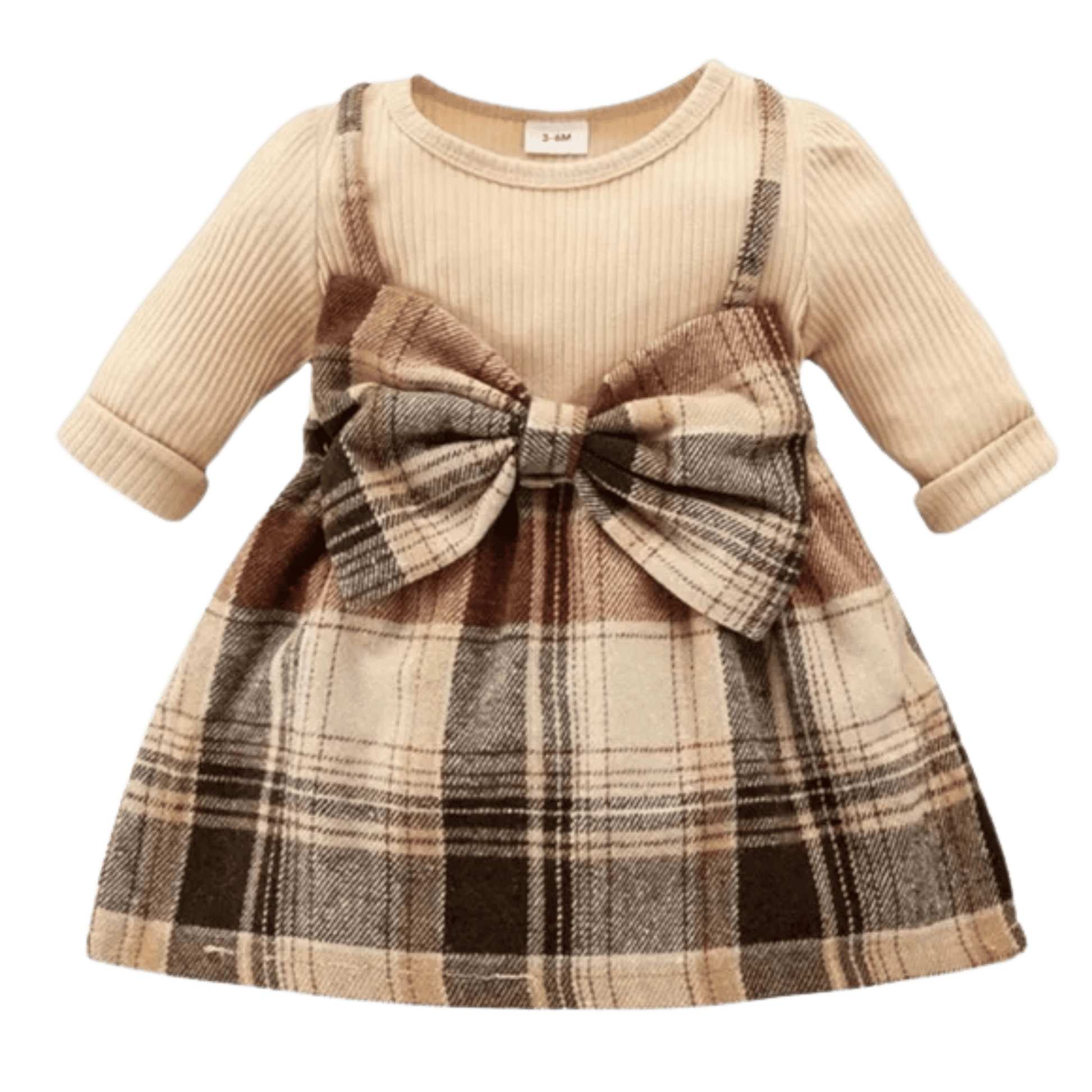 Children's dress with plaid skirt and bow detail on a green background