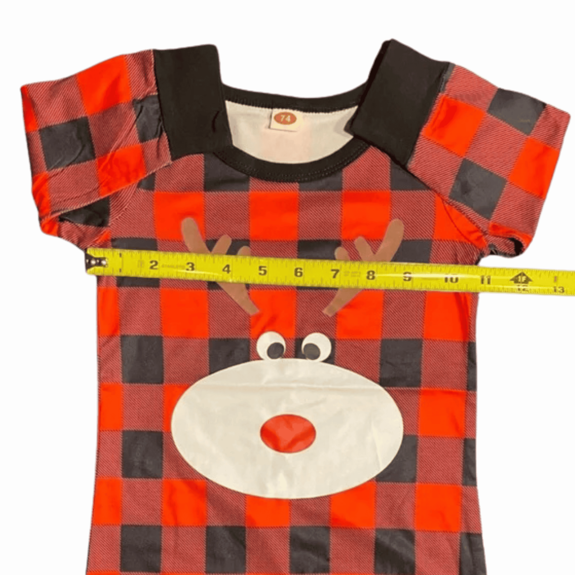 Red and black checkered dress with reindeer face design on a gray background