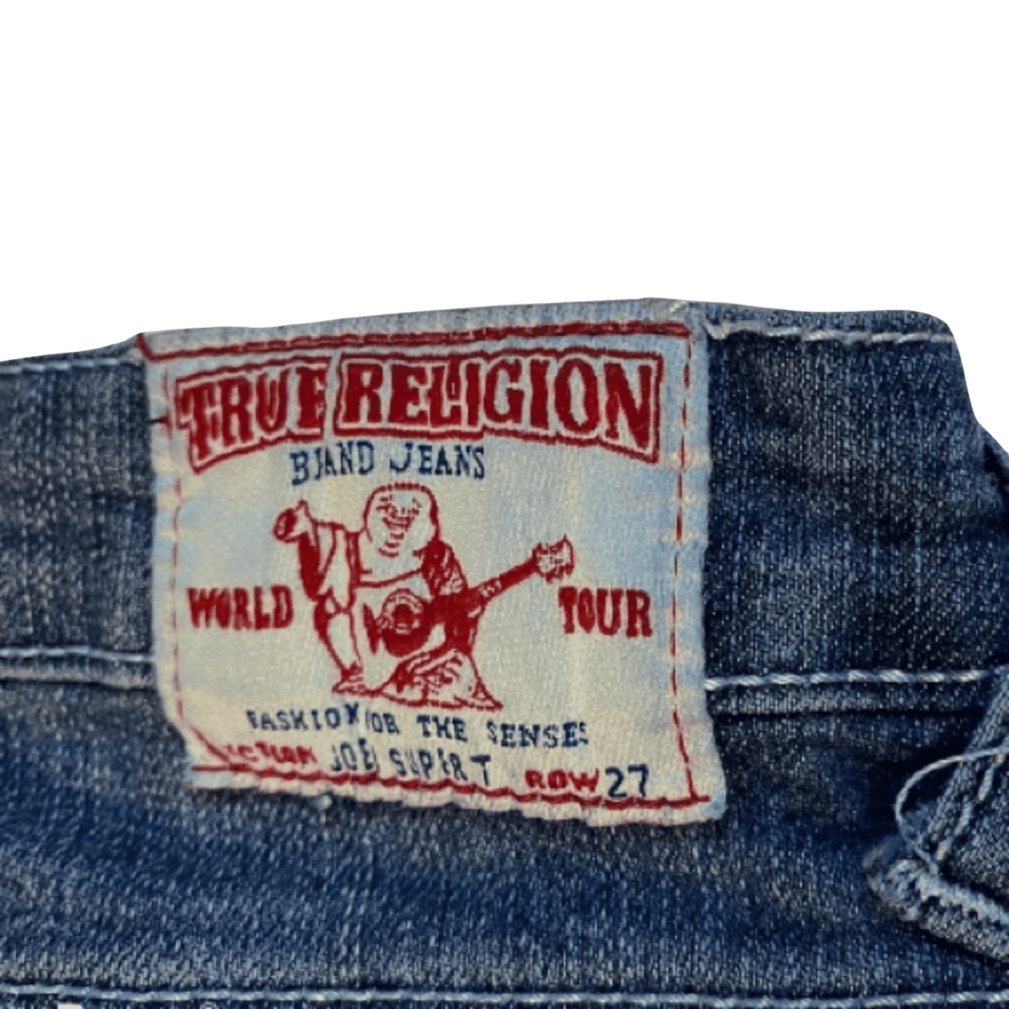 True Religion jeans label on a denim background