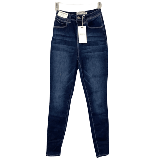 Pair of blue jeans with a tag on a transparent background