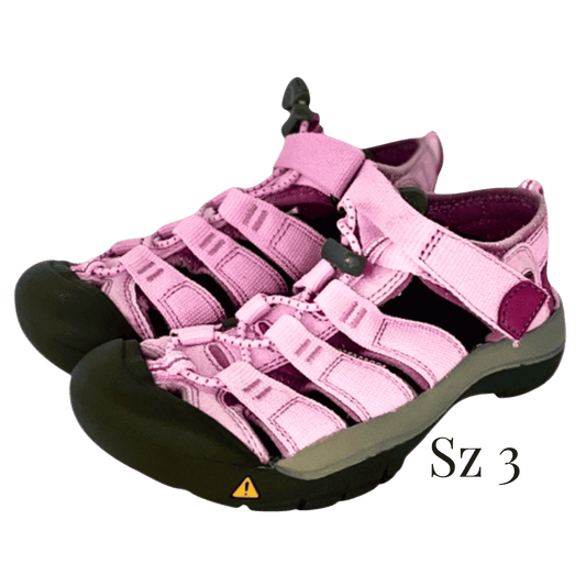 Pink sandal with black sole on a transparent background