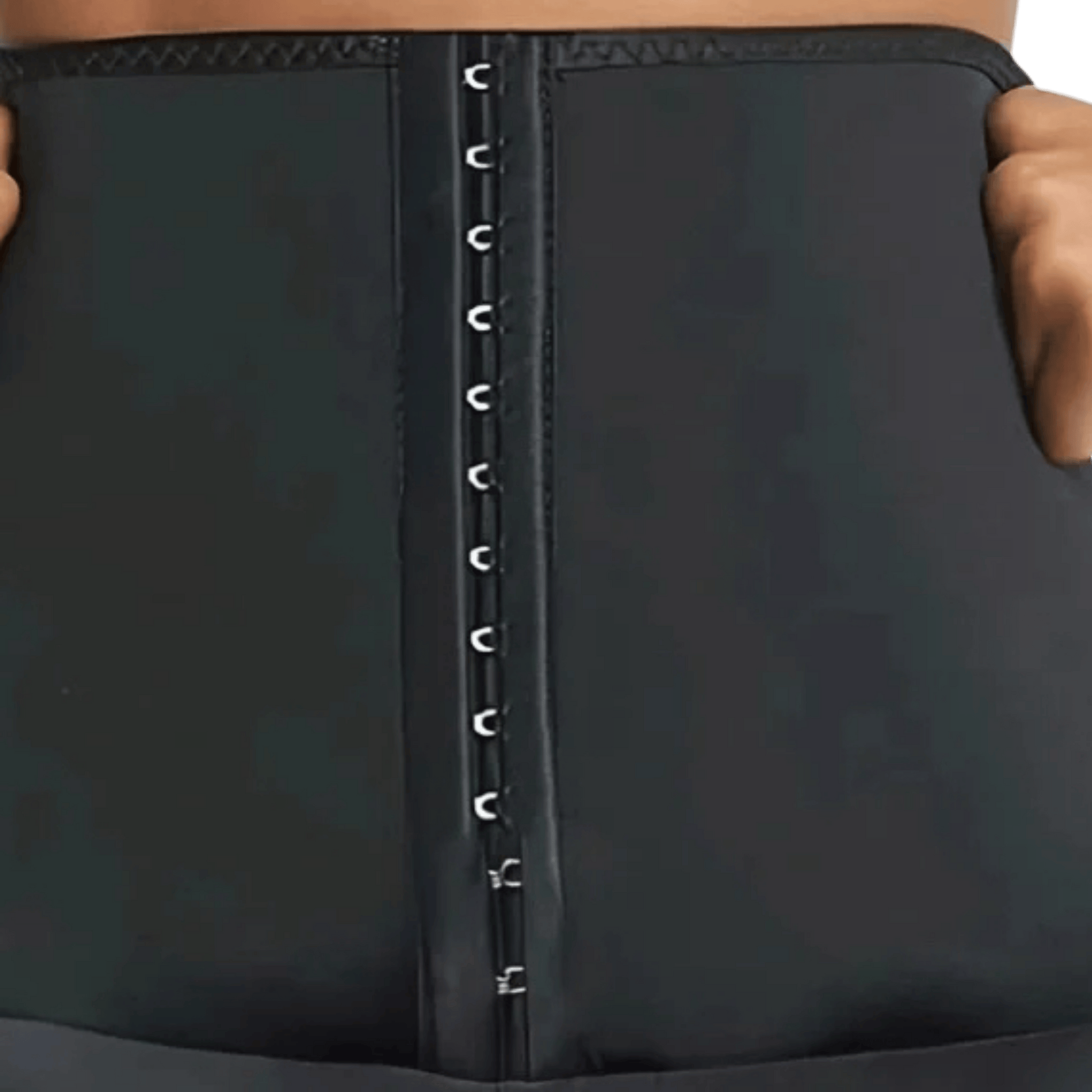 Close-up of a black waist trainer with a person holding it.