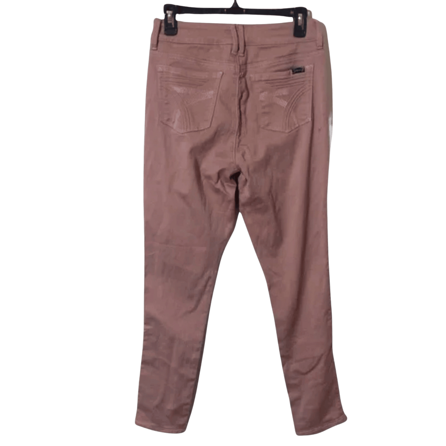 Brown pants on a hanger against a white background