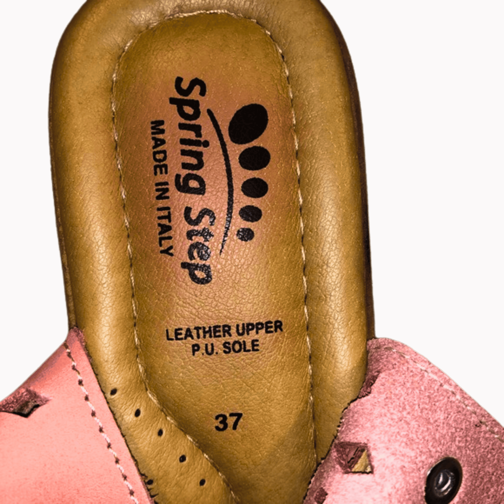 Close-up of a Spring Step shoe insole with branding and size information.