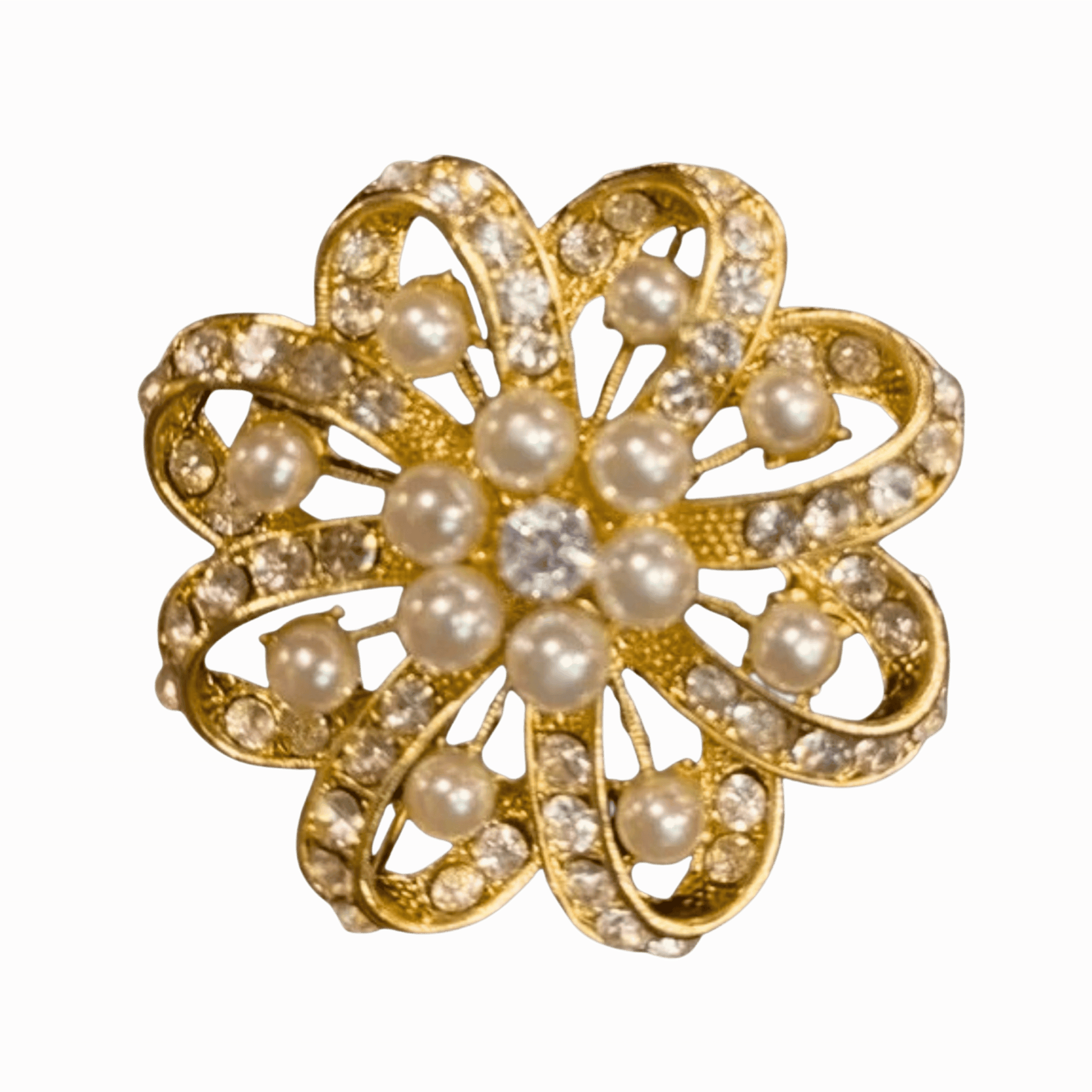 Gold brooch with pearls and crystals on a brown background