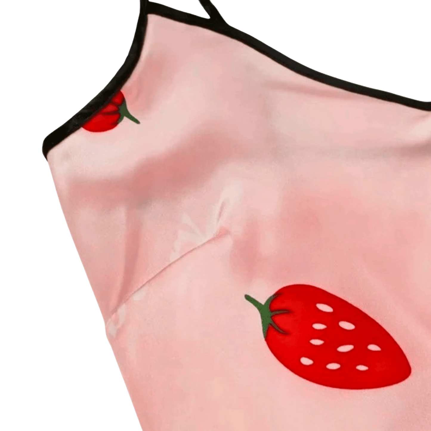 Pink fabric with red strawberry designs on a clear background