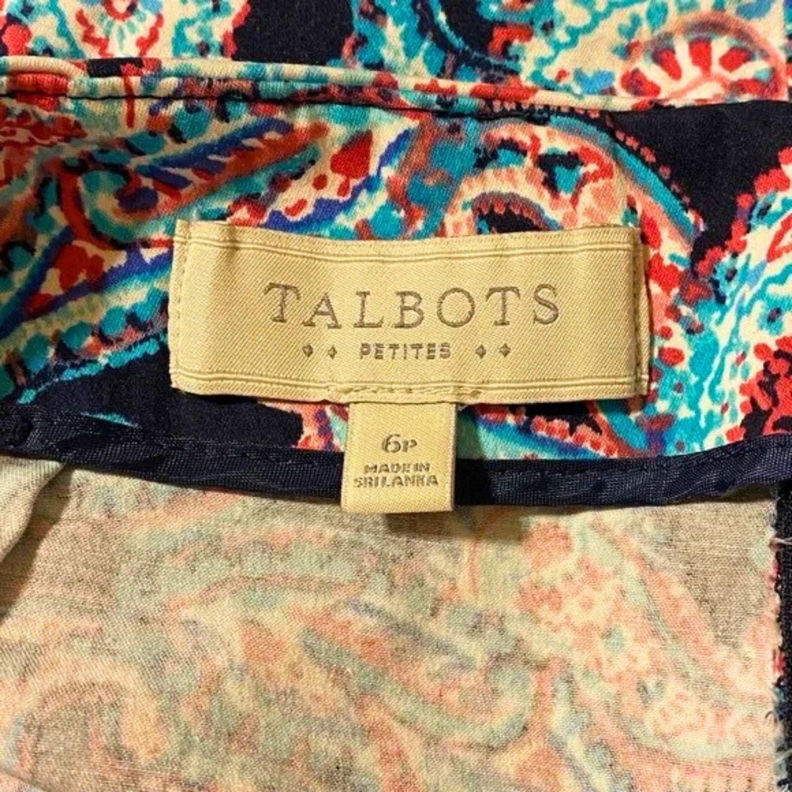 Talbots label on a colorful patterned garment