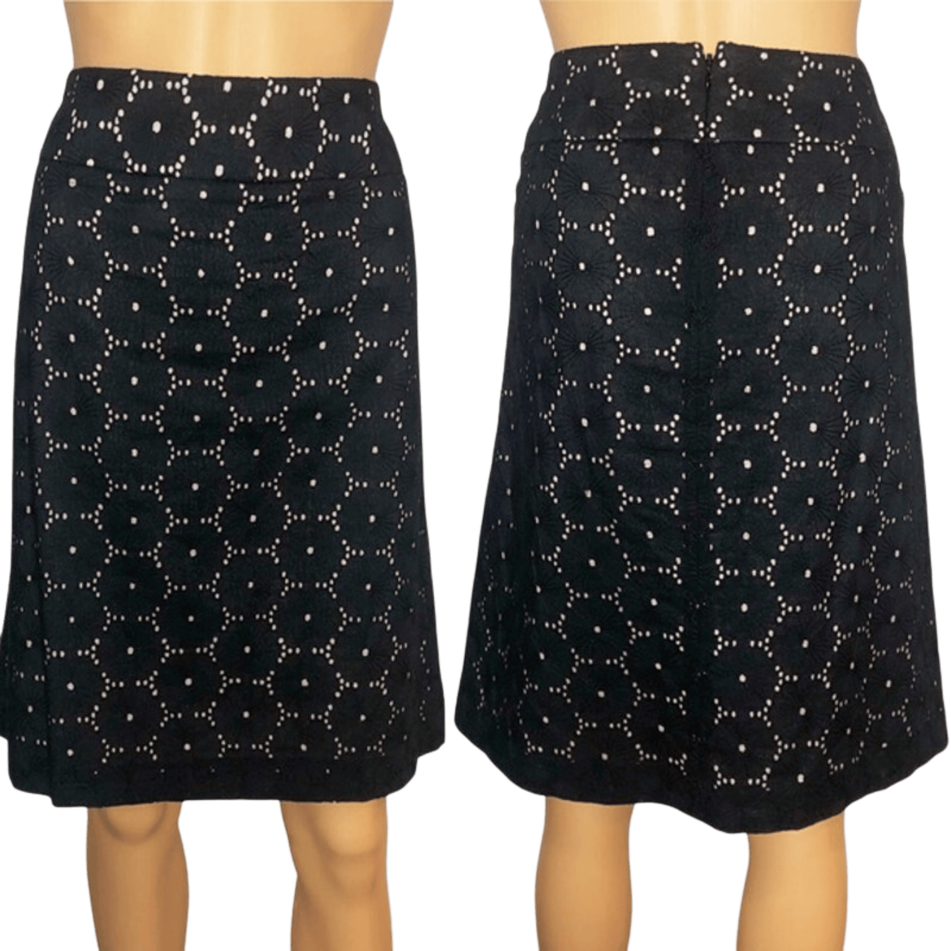 Black skirt with white floral pattern worn by a person on a transparent background