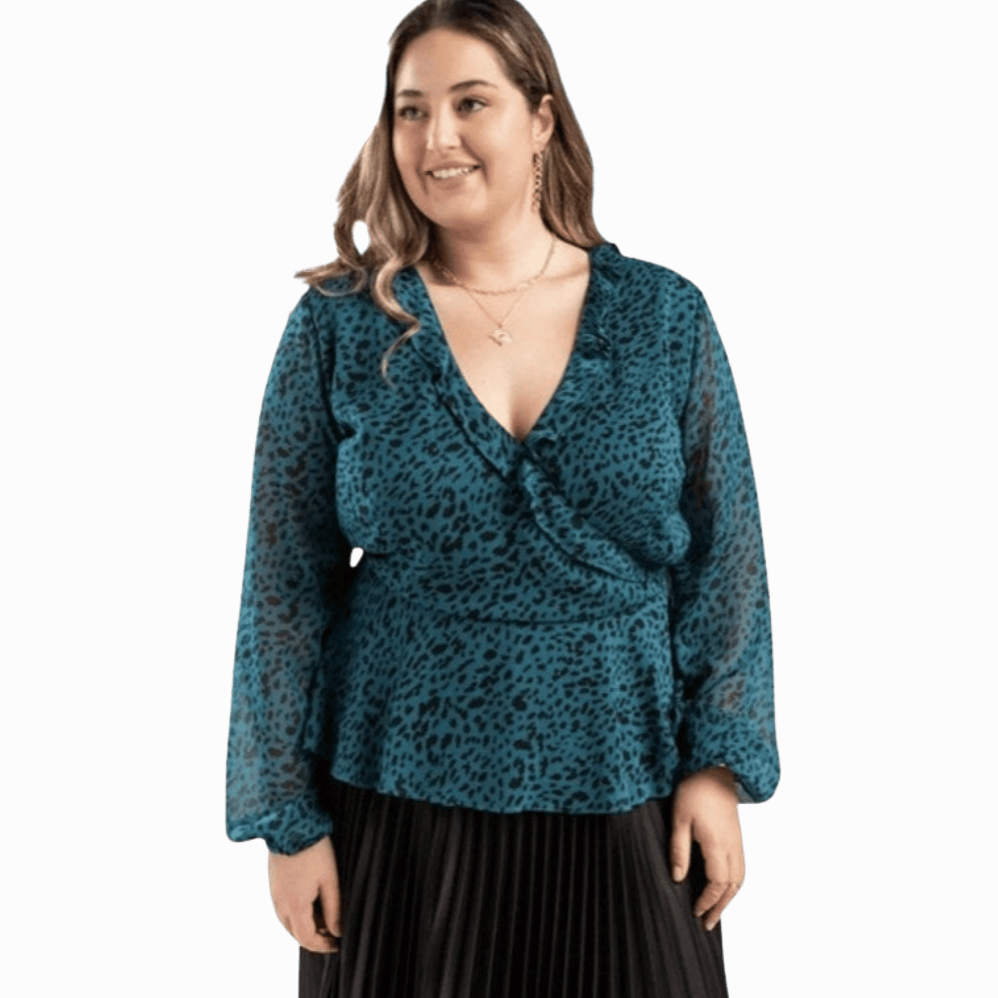 Woman wearing a teal leopard print top on a gray background