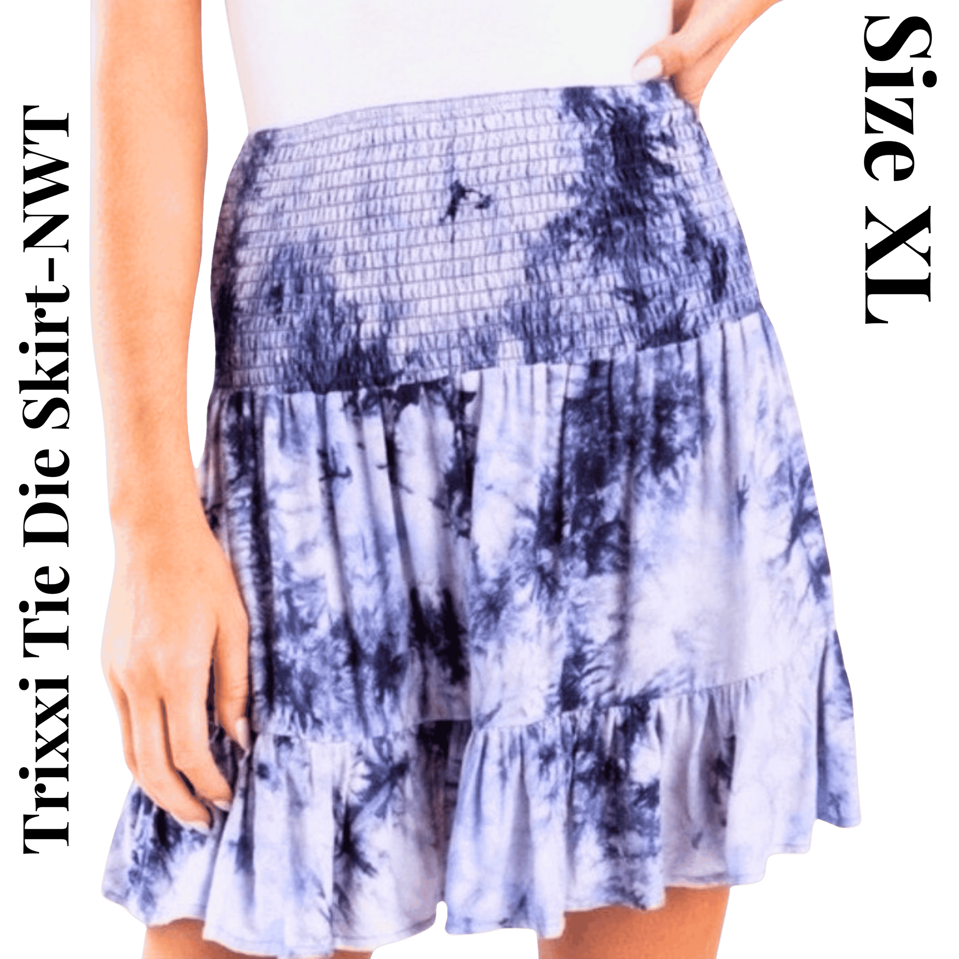 Tie die skirt with 'Trixxi' branding and size label on a transparent background