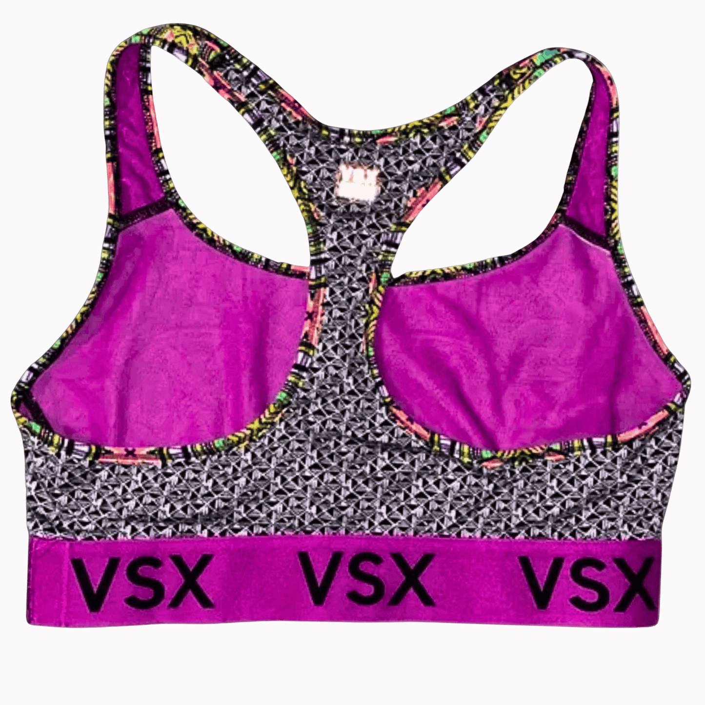 Purple sports bra with multicolor straps and 'VSX' branding on a brown background