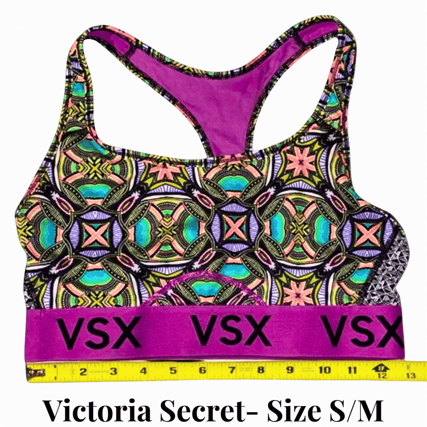 Victoria's Secret sports bra with colorful pattern and purple accents on a light green background
