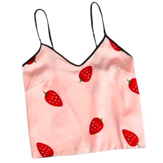 Pink top with strawberry pattern on a white background