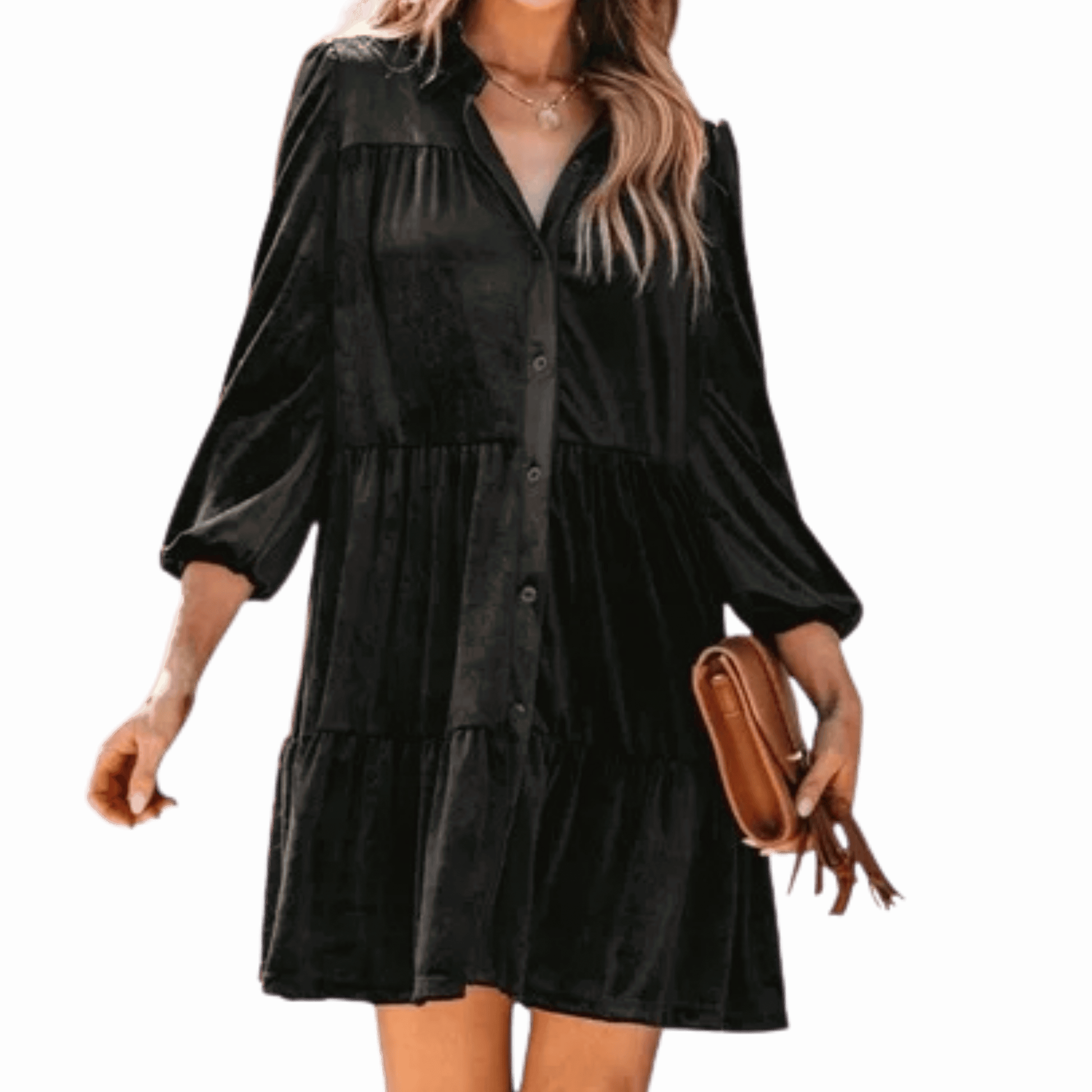 Woman wearing a black dress holding a brown clutch against a black background