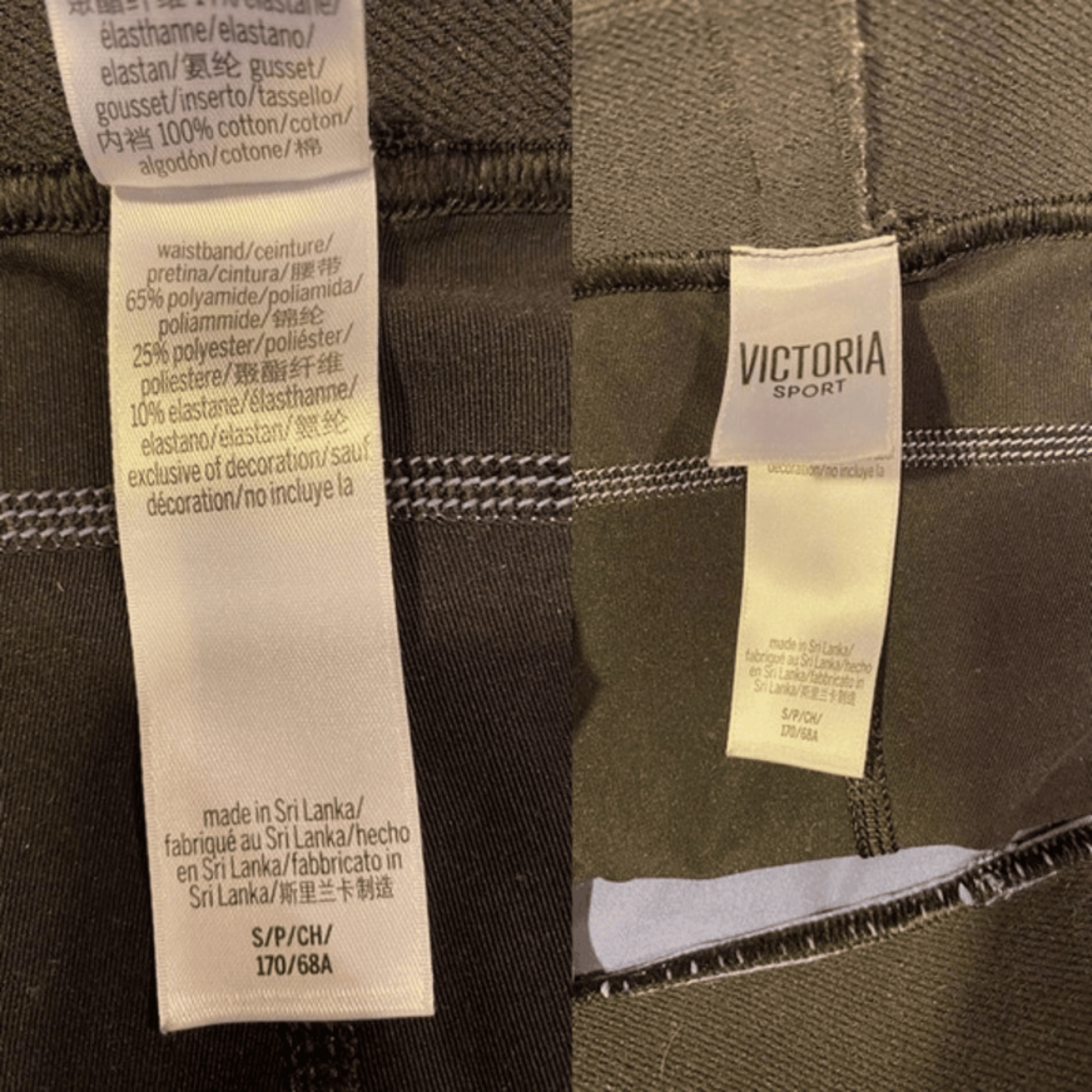 Close-up of fabric with 'Victoria Sport' label and text on a garment.