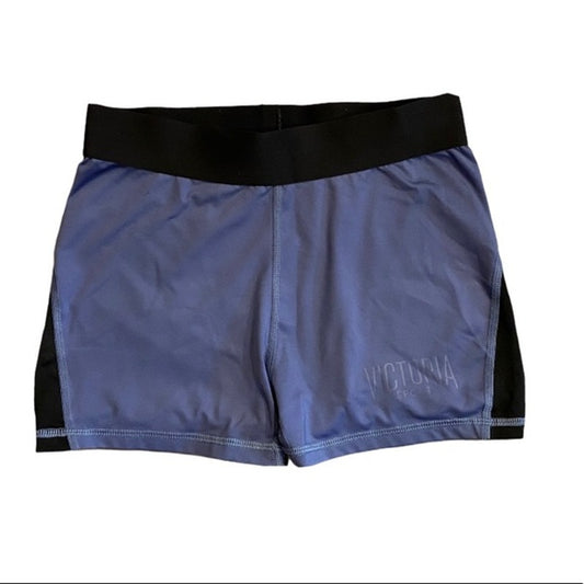 Blue athletic shorts with black waistband and side panels on a white background
