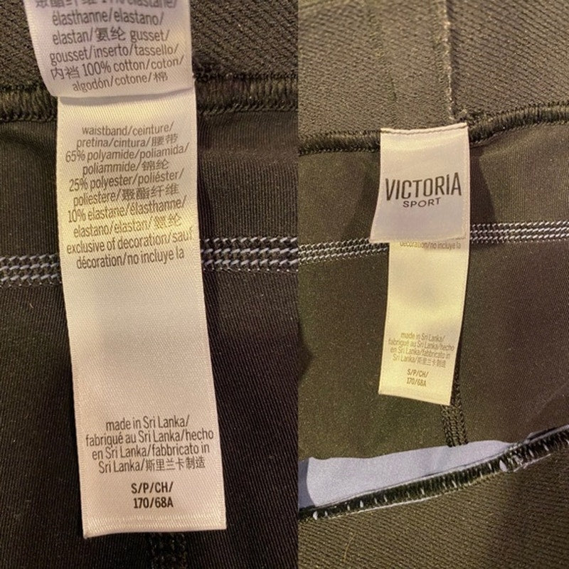 Close-up of fabric labels on a garment with 'Victoria Sport' branding.