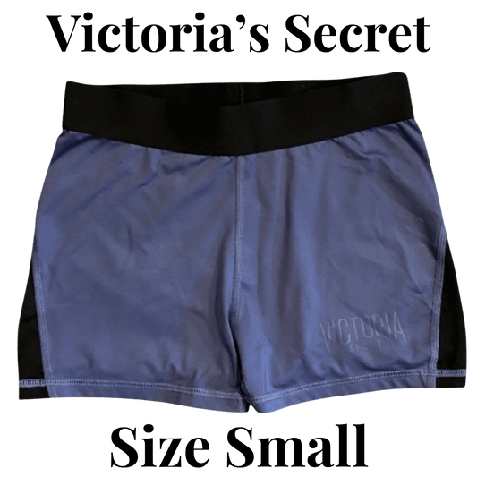 Victoria's Secret blue shorts with black waistband on a white background