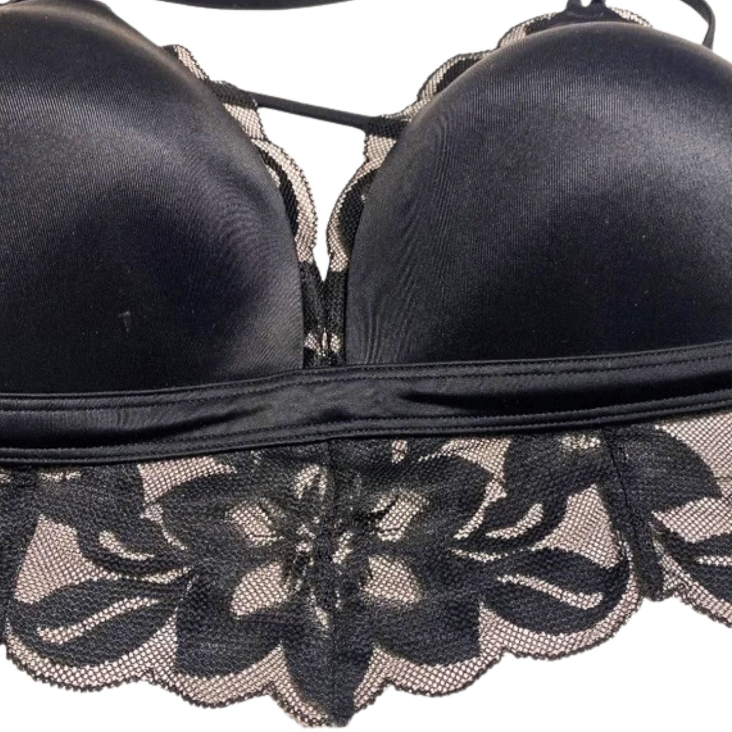 Black bra with lace details on a white background
