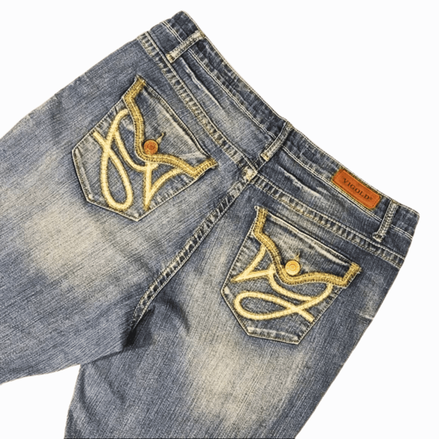 Blue jeans with gold embroidery on a purple background