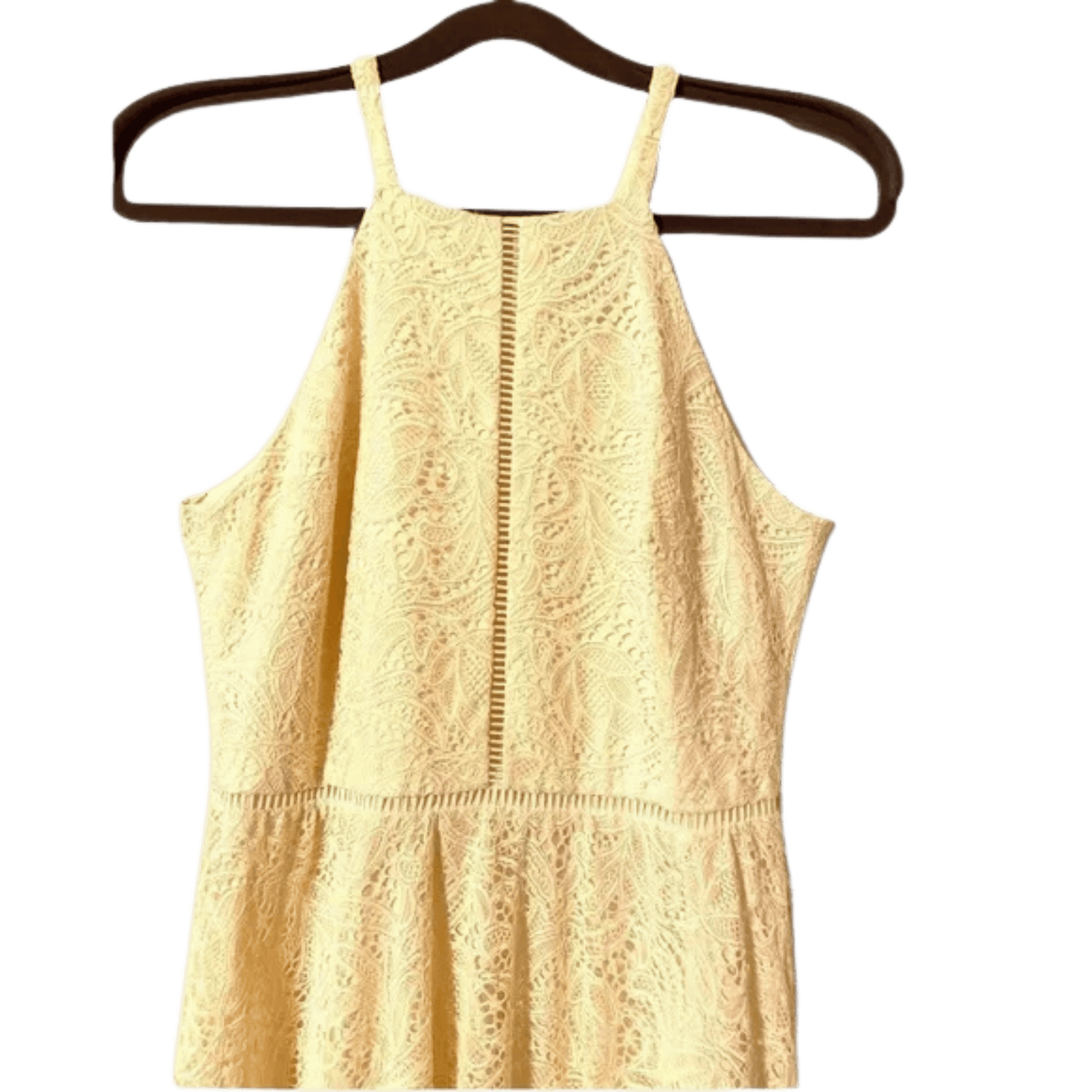 Yellow lace dress on a hanger against a white background