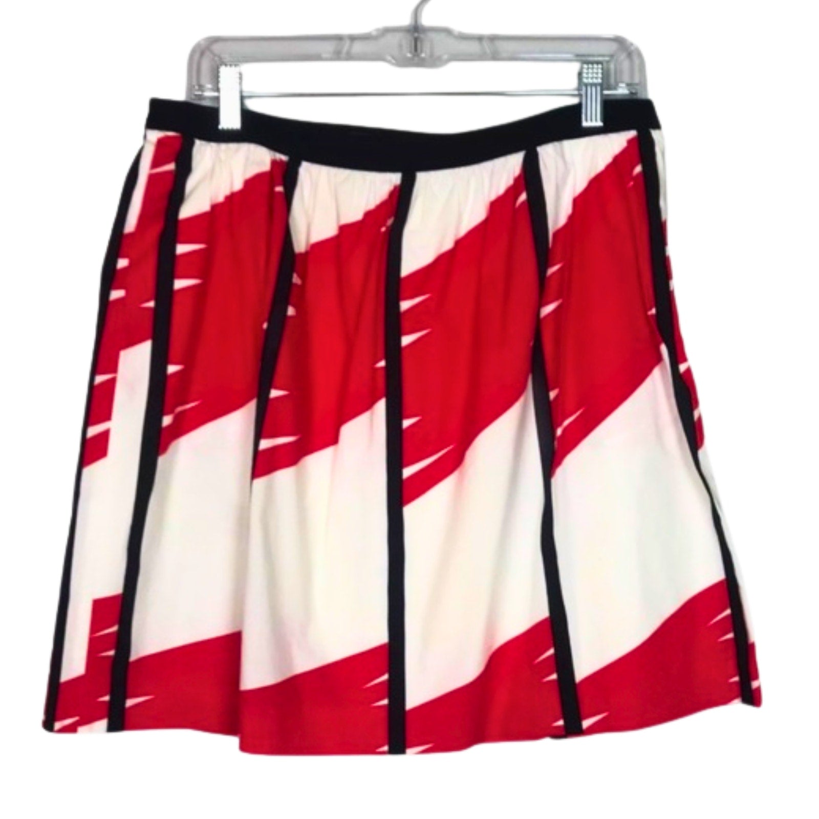 Skirt with red and white pattern on a hanger