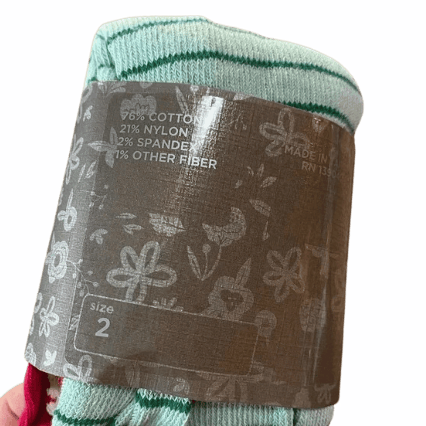 Pair of socks with a label on a blue background