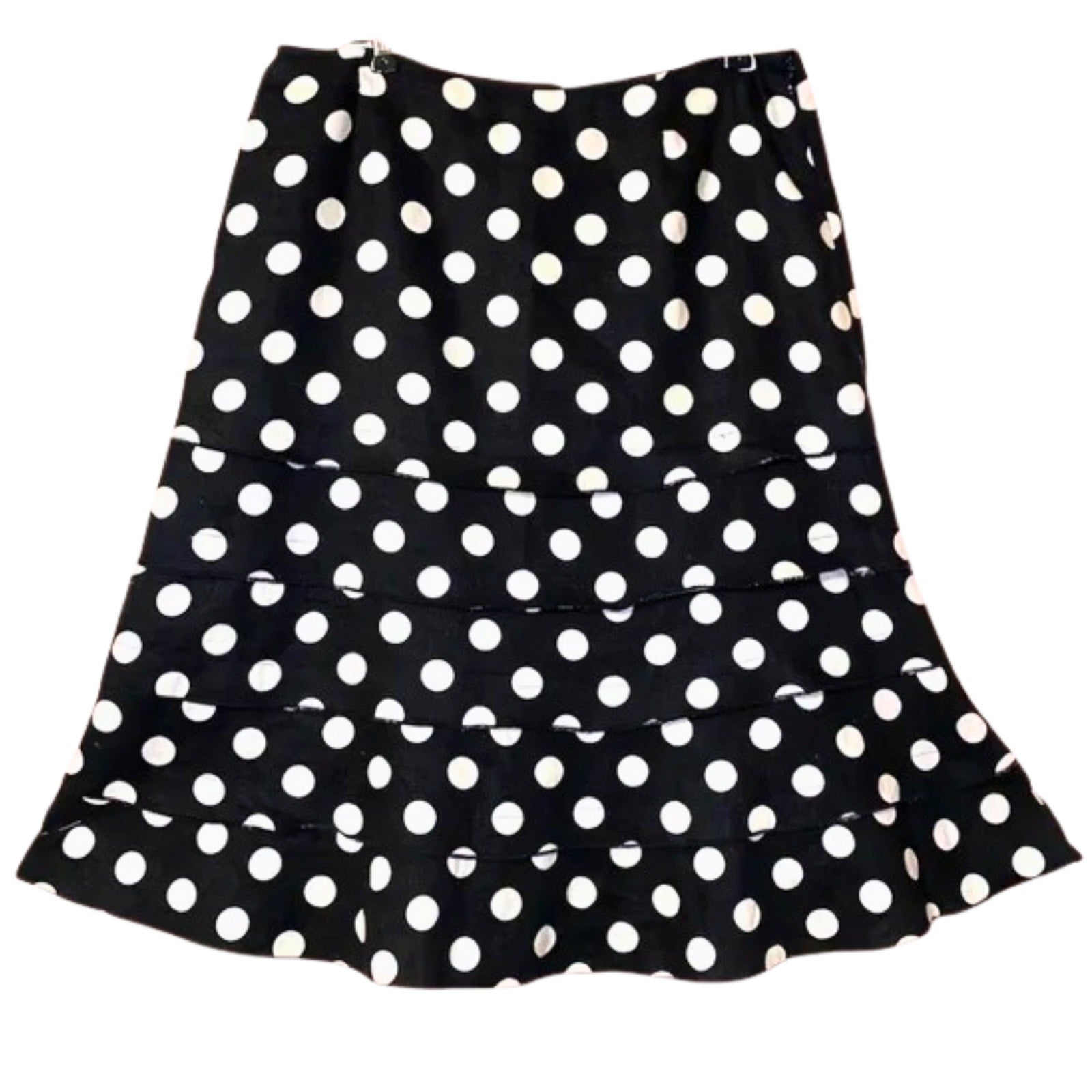 Black skirt with white polka dots on a white background