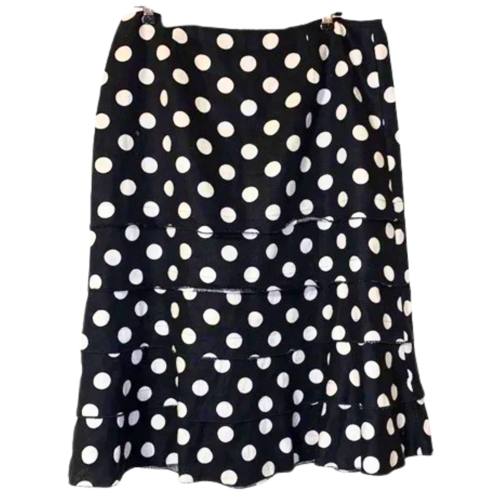 Black skirt with white polka dots on a white background
