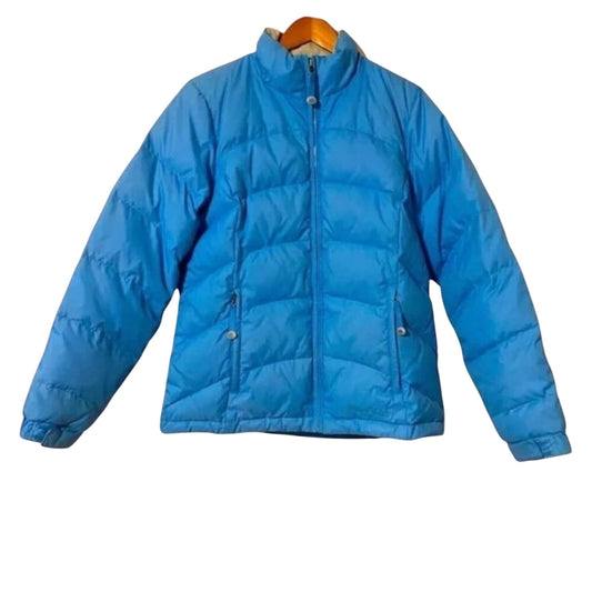 Blue puffer jacket on a white background