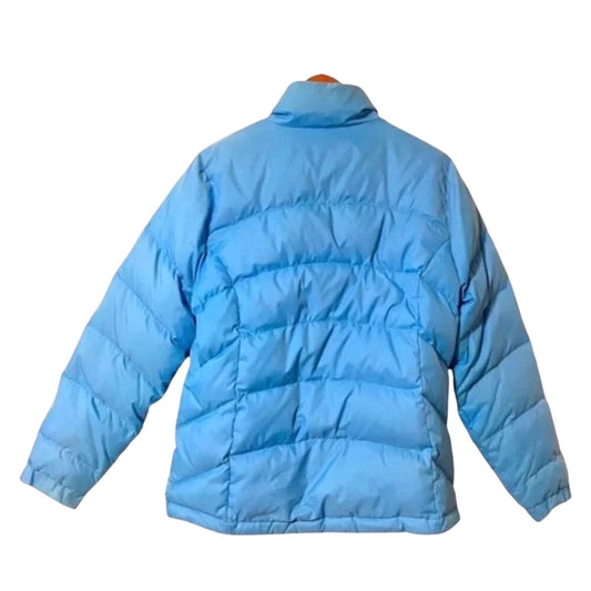 Blue puffer jacket on a white background