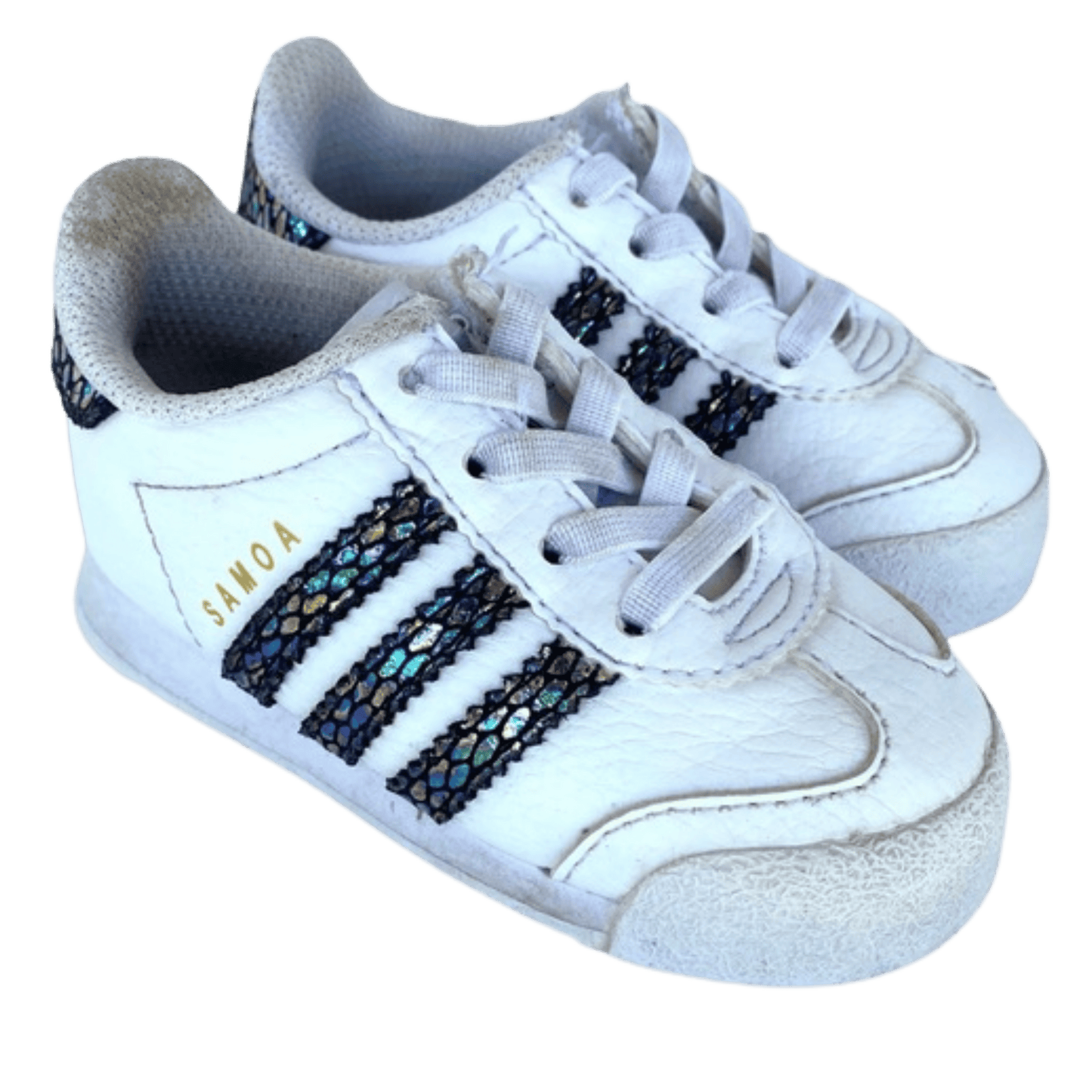 White sneakers with colorful stripes on a transparent background