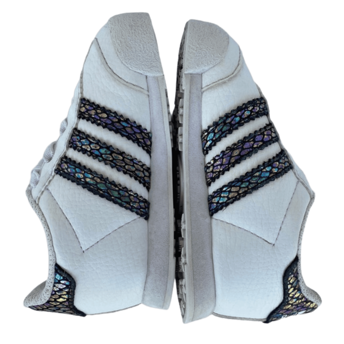 White shoe with black and blue pattern on a transparent background