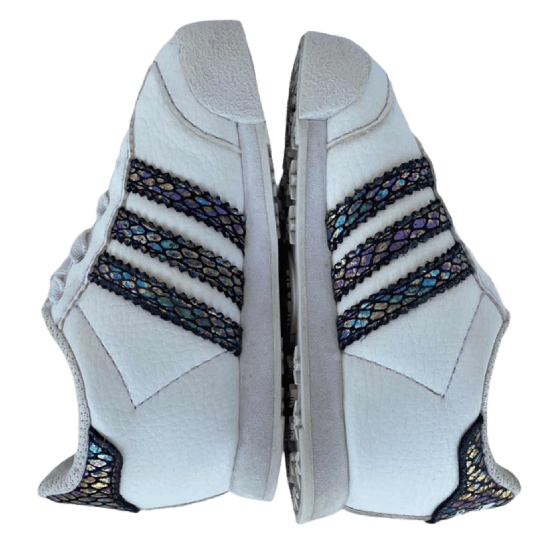 White shoe with black and blue pattern on a transparent background