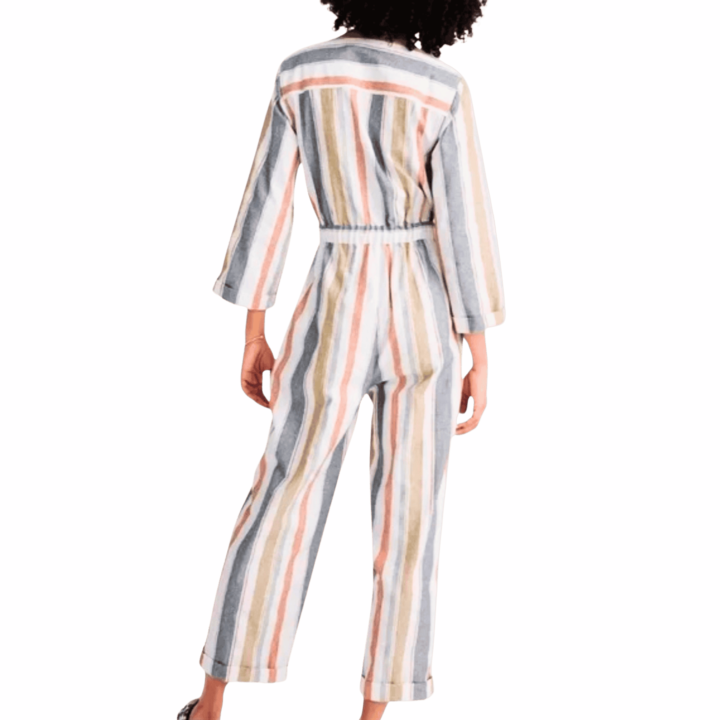 Person wearing a striped outfit on a pink background