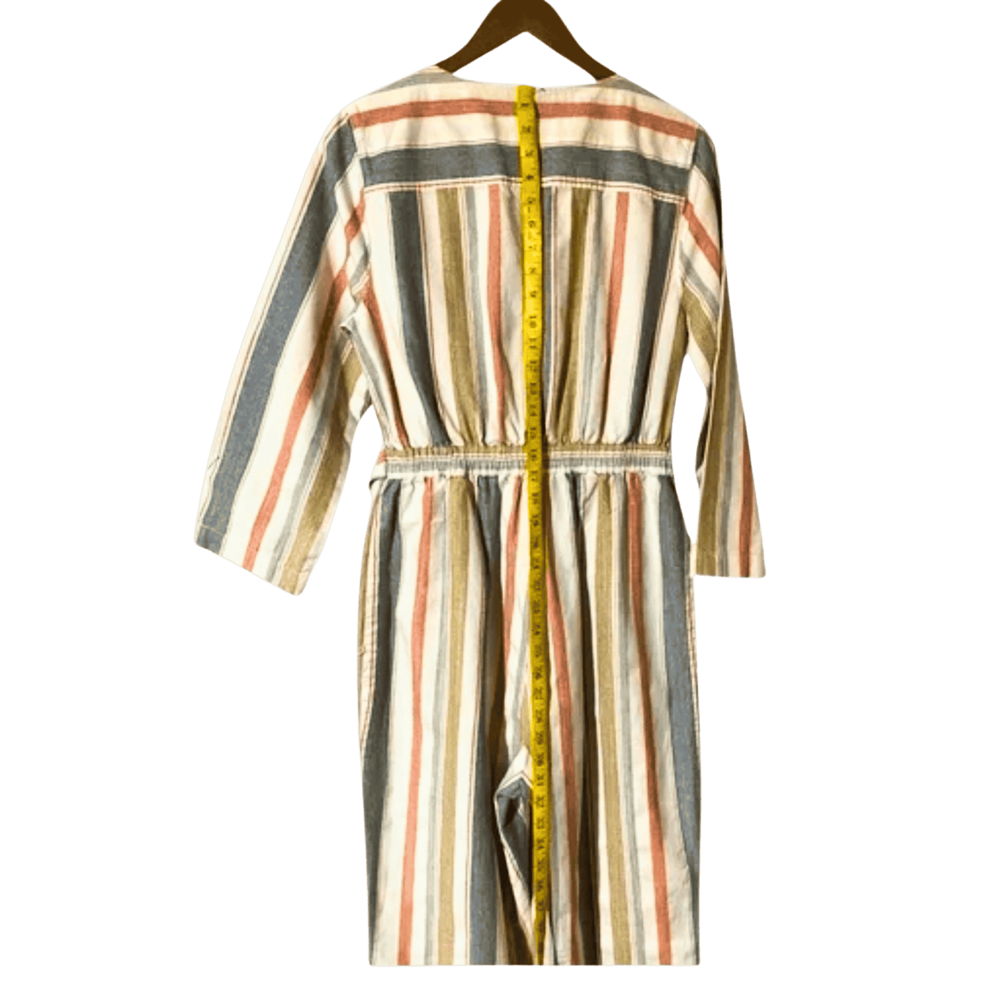 Striped dress on a hanger with a measuring tape, on a transparent background