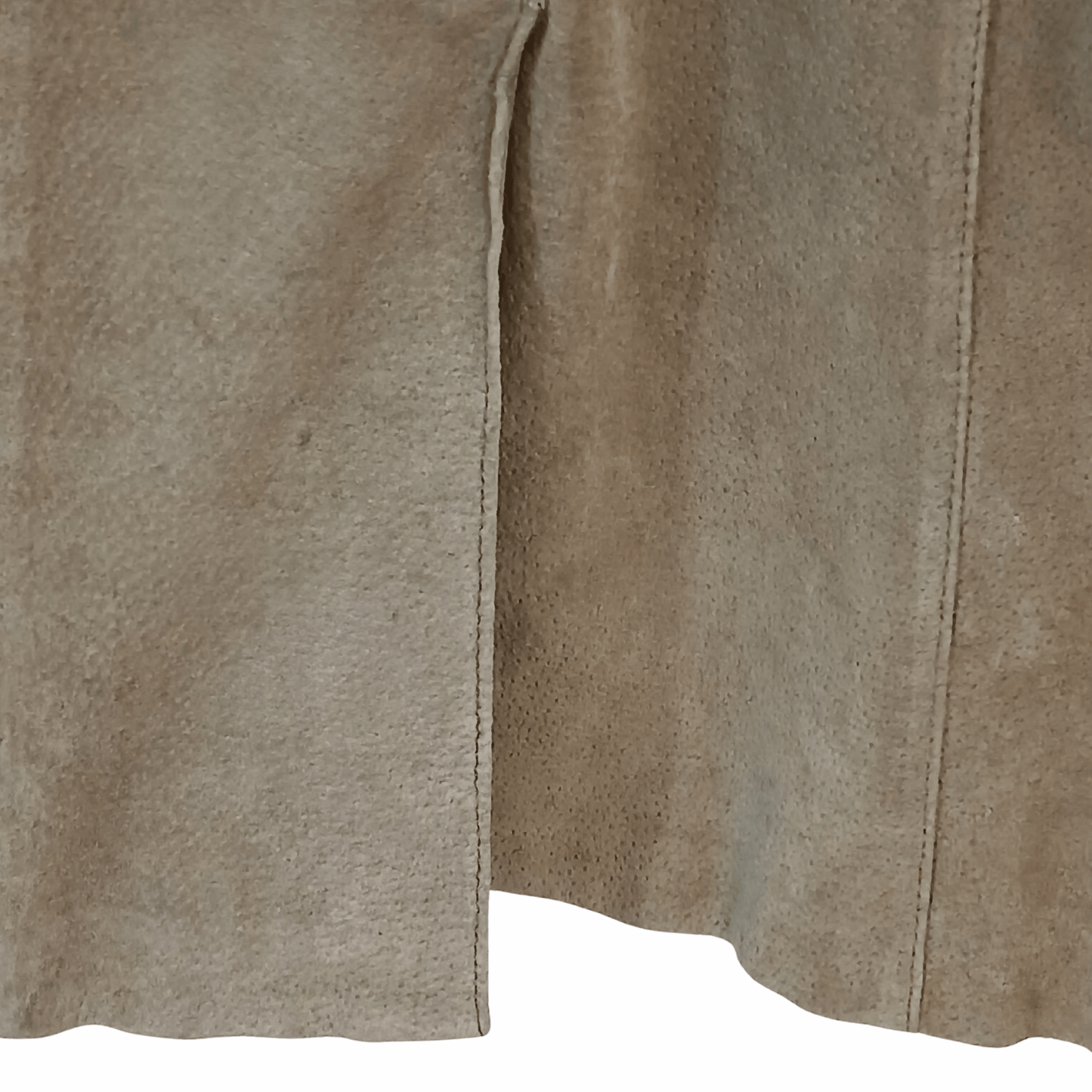 Close-up of brown leather texture with a blue background