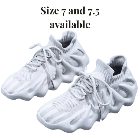 White sneakers on a transparent background with text indicating available sizes.