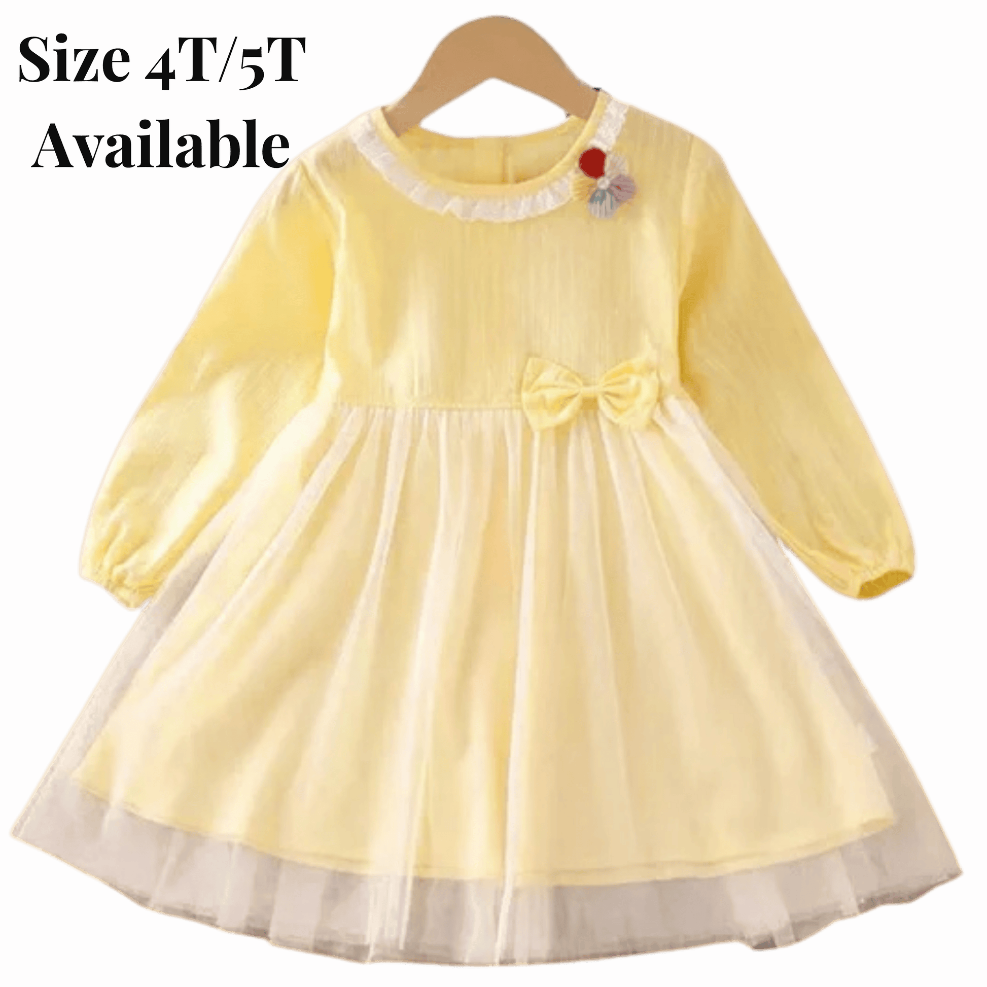 Yellow dress with a bow on a hanger against a red background